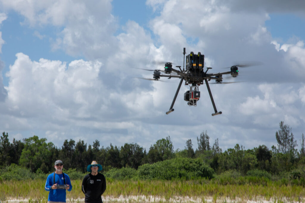 The UAV surveying crew from Caulfield and Wheeler use TrueView 3D Imaging Sensors from GeoCue to scan the Avenir Development